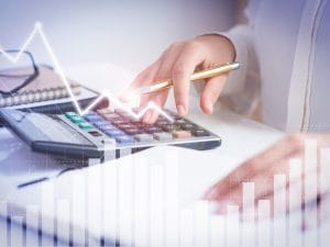 accountant-calculating-profit-with-financial-analysis-graphs